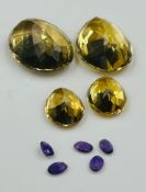 A selection of semi precious stones to include amethyst, citrine etc