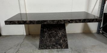 A black marble pedestal dining table (H77cm W180cm D100cm)