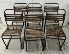 A set of six PEL nesting chairs, tubular steel stacking frames with beech slats and distressed