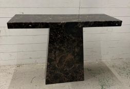 A black marble pedestal console table (H120cm W140cm D40cm)
