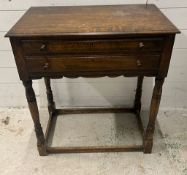 An oak cutlery table with drawers opening to felt lining (H77cm W68cm D40cm)