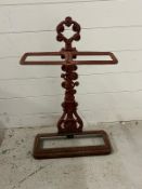 A twin cast metal umbrella stand
