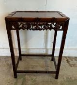 A Chinese hardwood side table (H58cm W42cm D29cm)