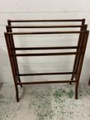 A mahogany towel rail