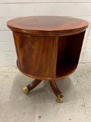A Regency style revolving mahogany bookcase (H64cm Dia54cm)