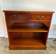 A two drawer veneered side cabinet with shelf under (H78cm W79cm D32cm)
