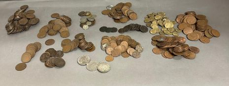 A quantity of mostly UK and some World coinage to include George III pennies, farthings and three