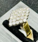 A vintage diamond cluster ring marquise setting, 18ct yellow and white gold. Diamond weight 1.78ct