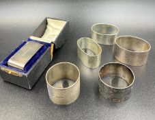 A set of six silver napkin rings, various makers and years, approximate weight 218g