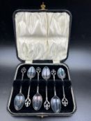 A boxed set of six silver teaspoons, hallmarked for Birmingham 1930 by TS