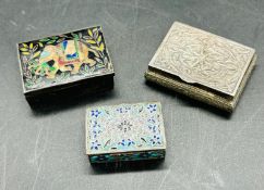 A selection of three silver pill boxes, various designs.