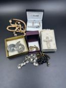 A selection of costume jewellery to include a silver cross hallmarked for Birmingham 1908 makers