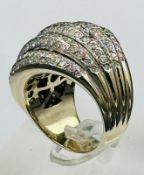 An 18ct gold modern diamond domed dress ring, 271 stones, combined total diamond weight 2.71ct,
