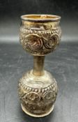 A silver Indian drinks measure, 10cm H