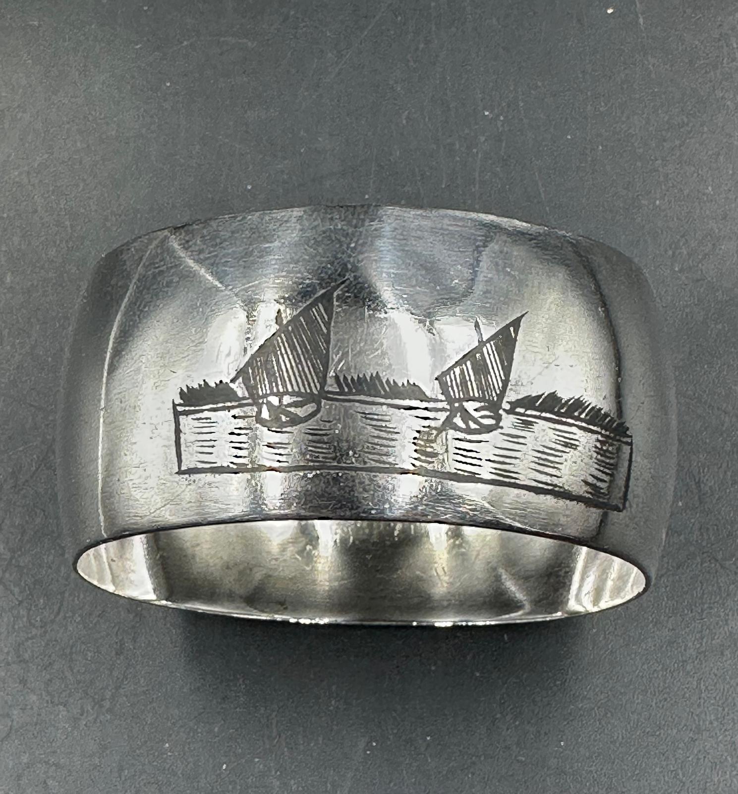 A set of six white metal Persian napkin rings with various scenes displayed on them. - Image 3 of 4