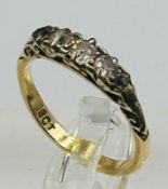 An 18ct gold five stone diamond ring approximate weight 2.6g and size L