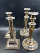 Two pairs of quality silverplated candlesticks