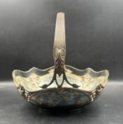 A silver plated Art Nouveau bowl with clear glass insert in the style of WMF