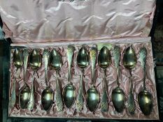 A boxed set of twelve Art Deco WMF spoons, with presentation plaque for 6th September 1908. Marked