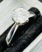A 1.51carat round brilliant cut diamond ring. Measurements 7.29 -7.34 x 4.50mm. Colour L1, colour