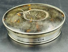 A silver and tortoiseshell pot lid by Alexander Clark & Co Ltd, hallmarked for Birmingham 1925.