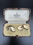 A pair of 9ct gold cuff links, approximate weight 4g