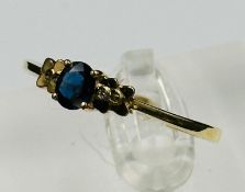 An 18ct gold sapphire and diamond style ring, size Y, approximate weight 2.3g.