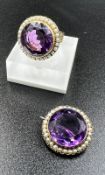 A 14ct gold amethyst and seed pearl cocktail ring, marked 14ct with a matching brooch. Ring weighs