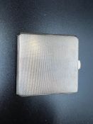 A silver cigarette case by W T Toghill & Co, hallmarked for Birmingham 1956 approximate weight 90g