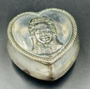 A heart shaped with trinket box the lid embossed with a bust portrait of W.S. Penley in costume