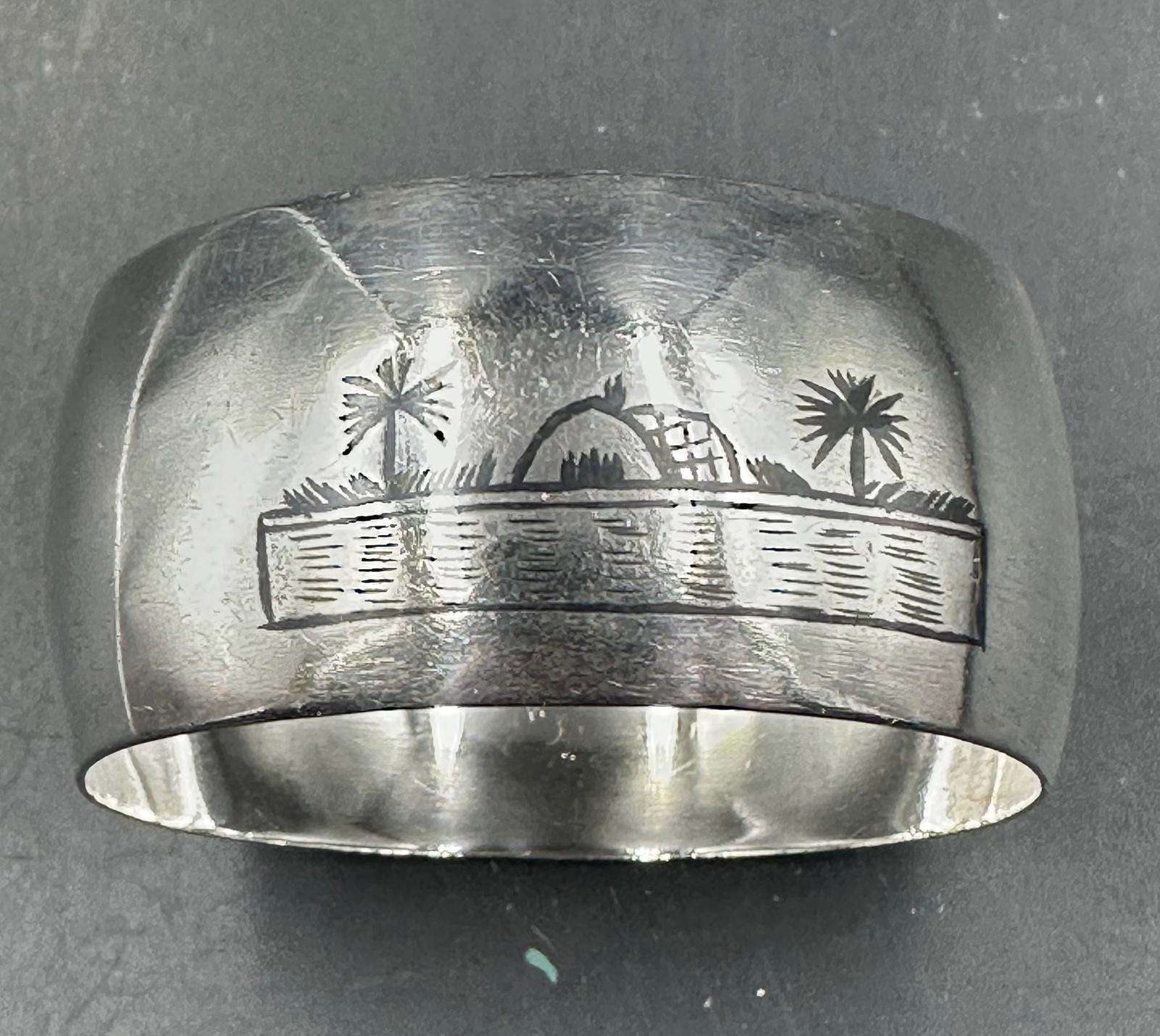 A set of six white metal Persian napkin rings with various scenes displayed on them. - Image 2 of 4