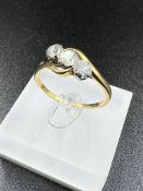 Antique style three stone diamond ring with a later London hallmark, centre stone 0.45ct, side