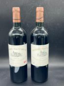 Teo bottles of Chateau Balans Haut Brion 2004