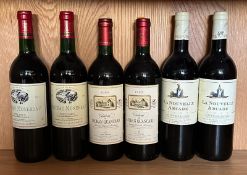 Two bottles of Chateau Monereau 2003, two bottle of Chateau De Sadran Quancard 1990 and two