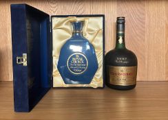 A bottle of Long John Royal Choice blended 21 year old whiskey (cased) and a bottle of Courvoisier