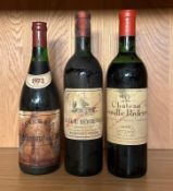 A bottle of Chateau Beychevelle 1971, a bottle of Chateau Leoville Poyferre and a bottle of 1972
