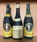 A bottle of Navarro Cosecha 1990 and two Rioja Reserva Faustino V, A 1988 and a 1983