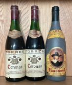 Two bottle of Torres Coronas 1985 and a Faustino I 1992