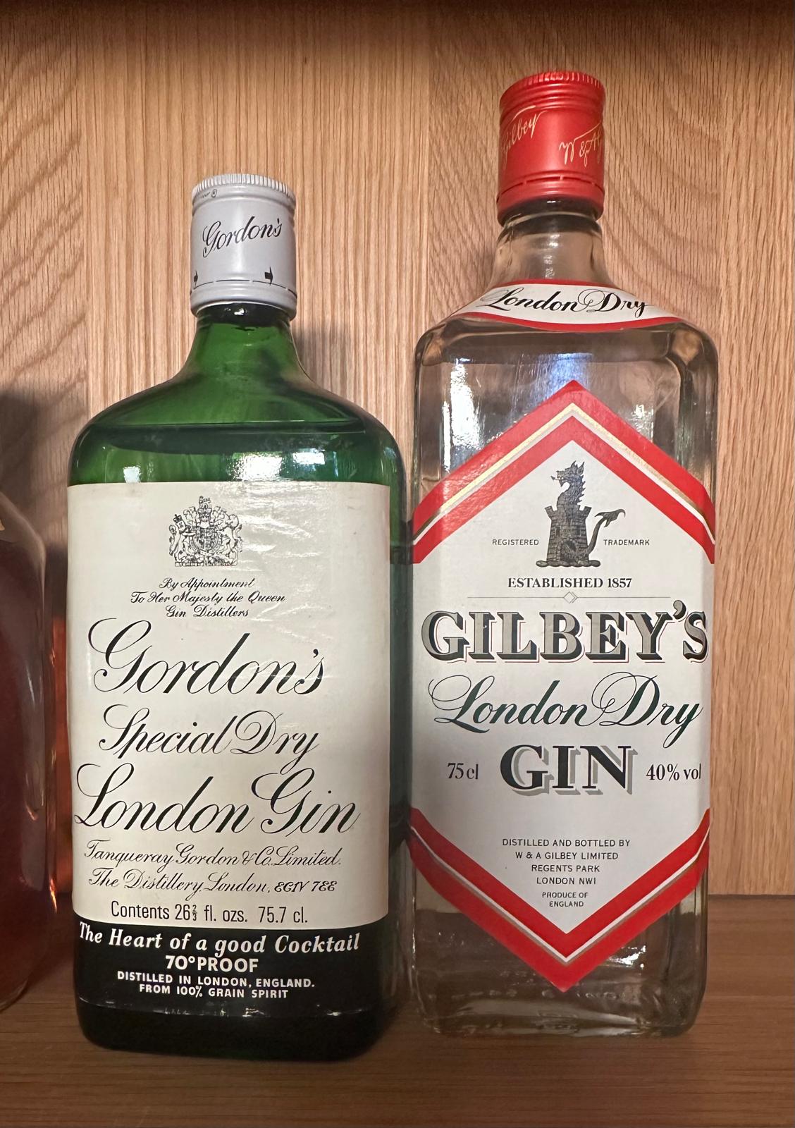 Four bottles of spirits, a Dimple blended scotch whiskey. a Gordons gin, a Gilbeys gin and a - Image 2 of 3