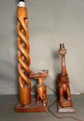 Two carved wooden elephant themed table lamps