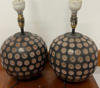 A pair of ceramic orb lamps