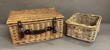 A small wicker hamper and a wicker storage basket