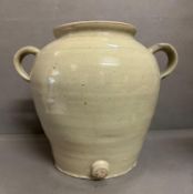 A glazed stoneware vinegar jar. Height 32 cm