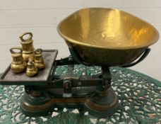 A set of vintage scales with weights