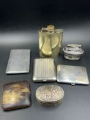A selection of white metal items to include hip flask, cigarette cases, pill box and a Ronson