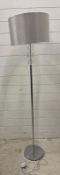 A chrome floor standing lamp with cubic Perspex detail