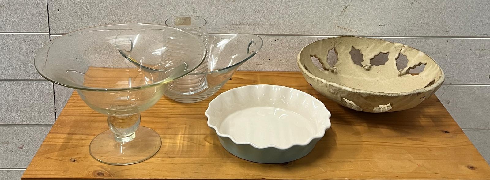 A selection of glass and china along with a holly theme dish