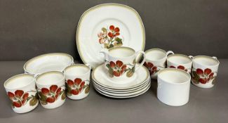 A part Susie Cooper Nasturtium tea service to include cups, saucers and plates