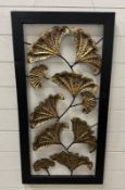 A metal Gingko leaf decorative wall hanging in a black wooden frame 48cm x 94cm