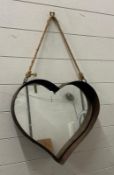 A metal framed heart shaped wall hanging mirror 41cm x 45cm